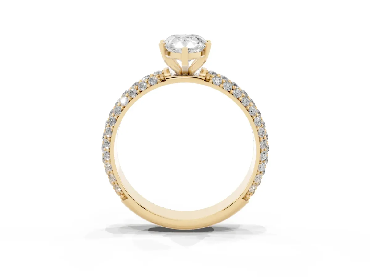 Pear Cut Diamond Solitaire Ring with Prong Setting and Pavé Band Yellow gold