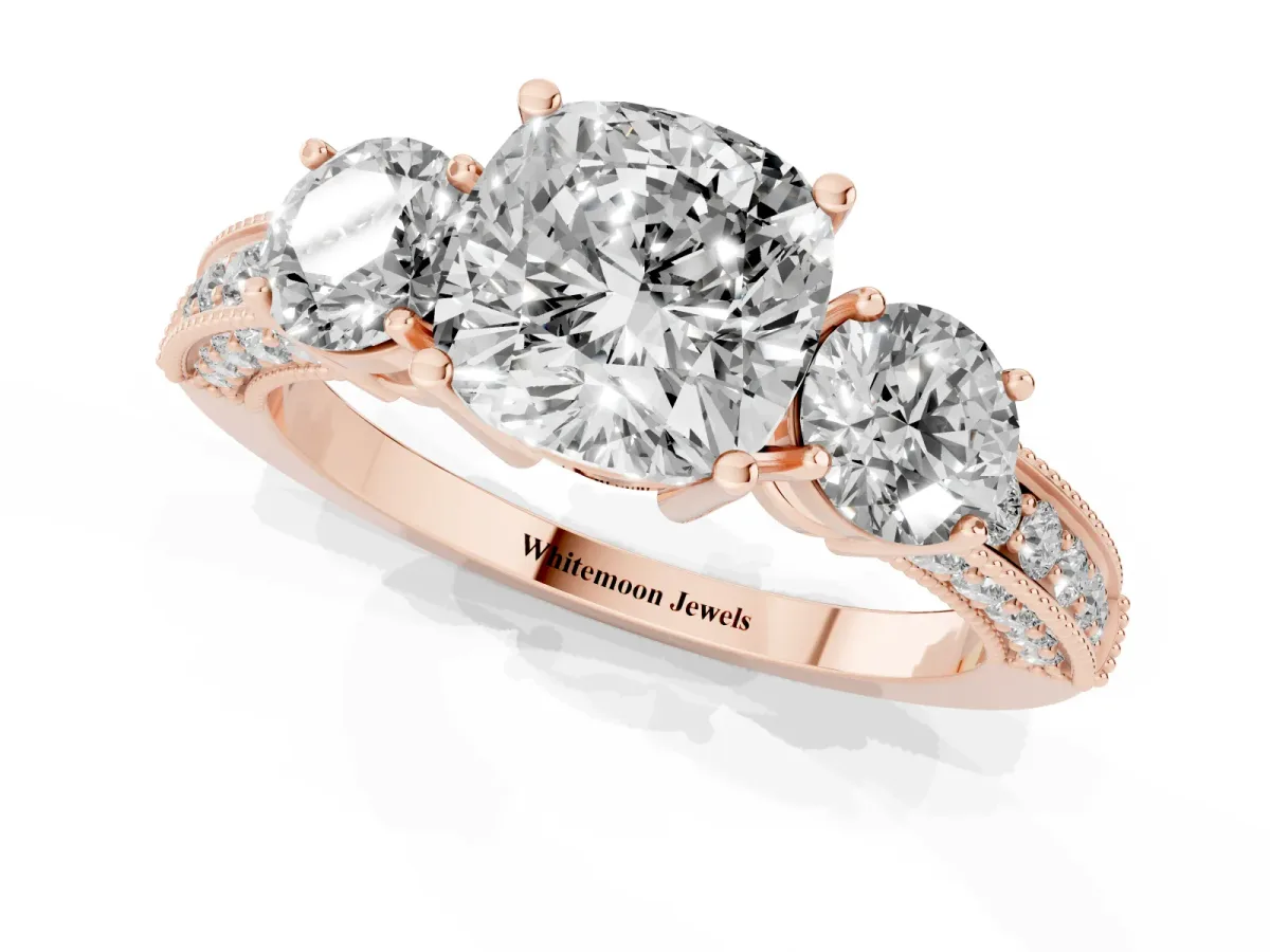 Cushion Cut Three-Stone Diamond Ring with Pavé Band and Four-Prong Setting Rose gold