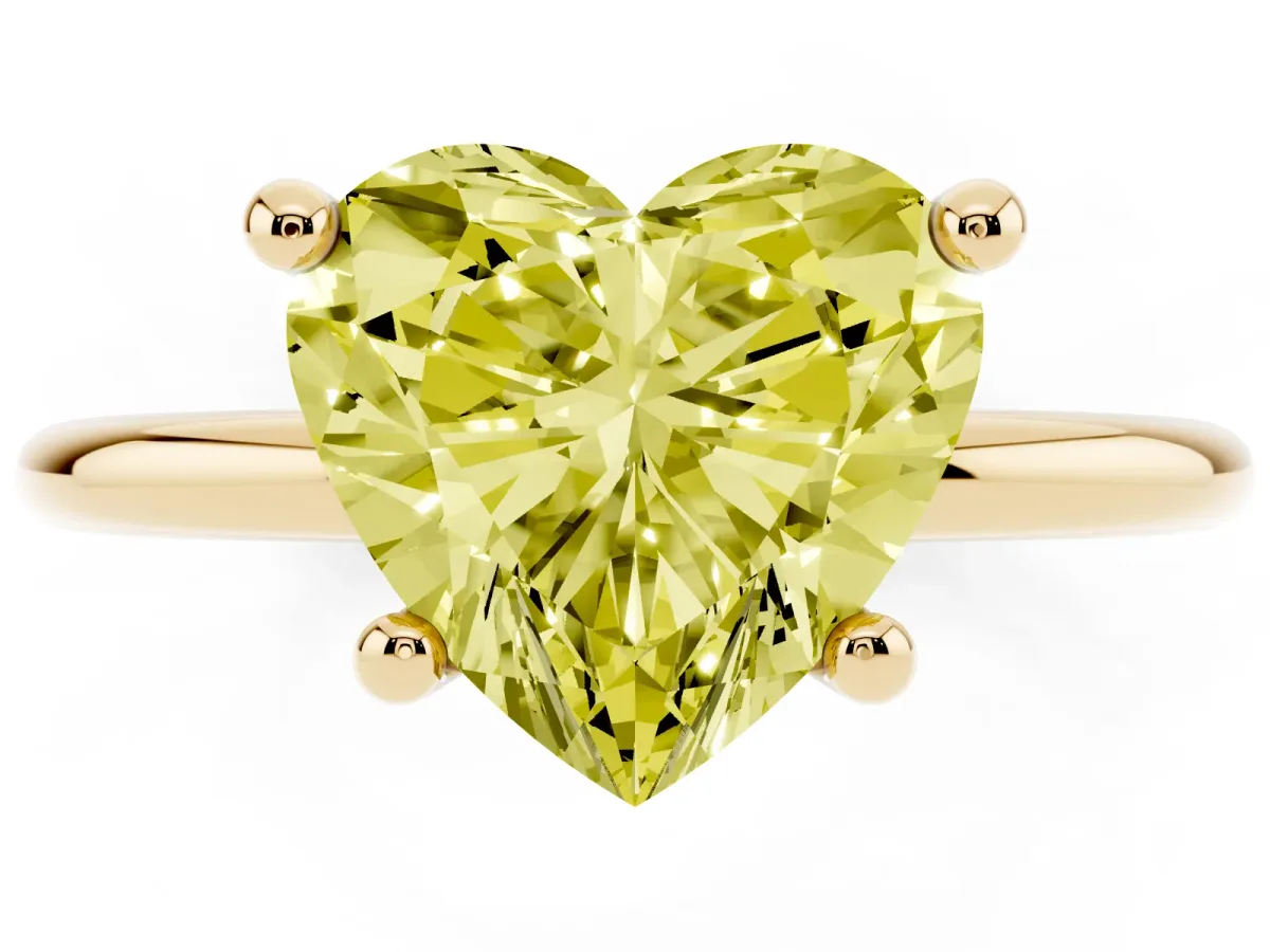 Fancy Yellow Heart Cut Solitaire Diamond Ring with 4-Prong Setting on a Classic Band Yellow gold