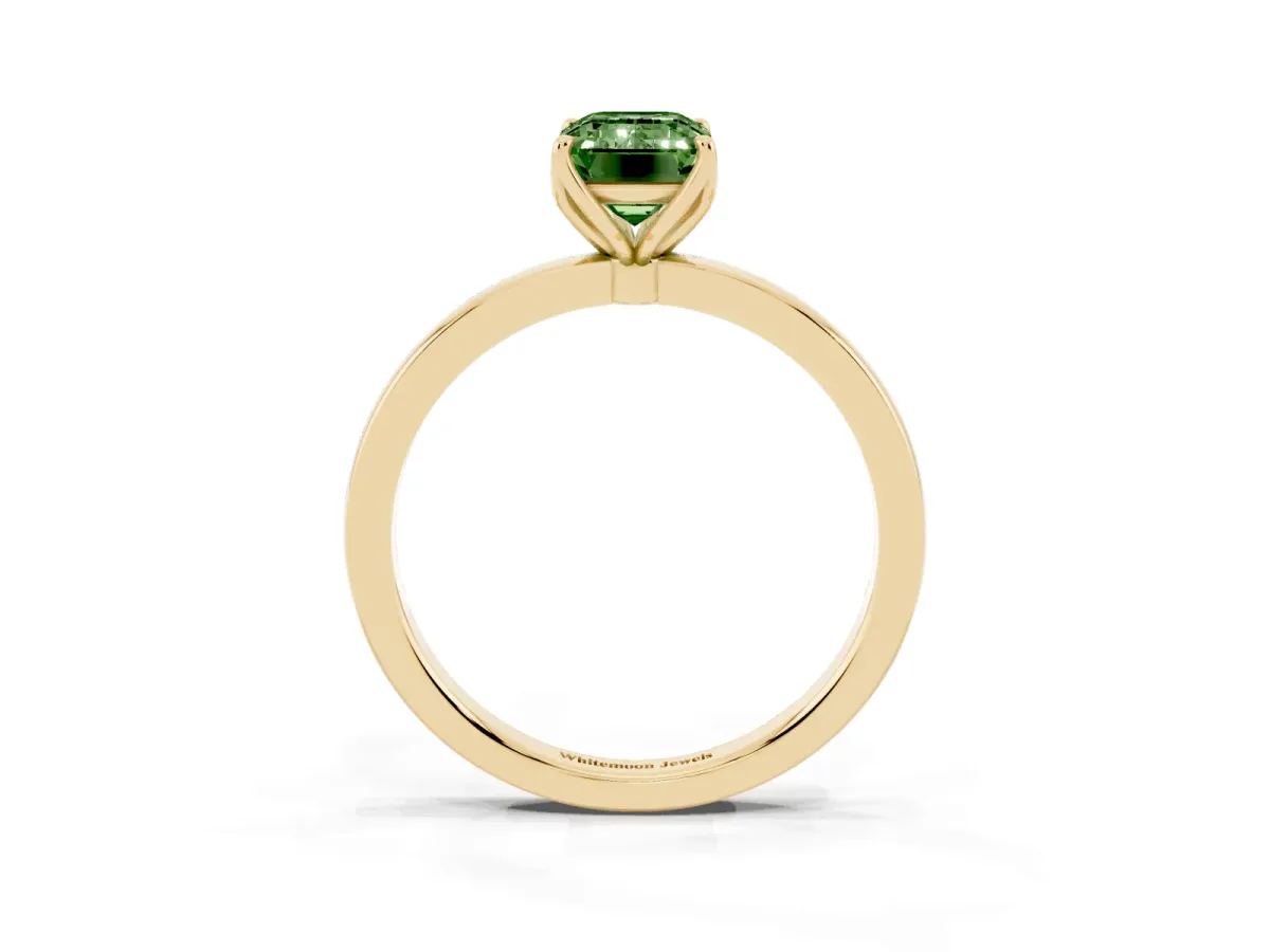 Fancy Green Emerald Cut Diamond Solitaire Ring with Thin Band and Prong Setting Yellow gold