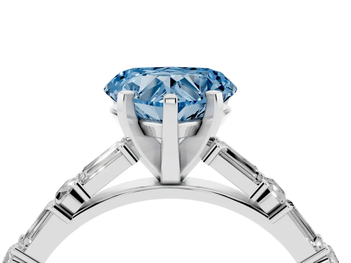 Fancy Blue Heart Cut Diamond Solitaire with Side Baguettes and Channel Set Band Silver