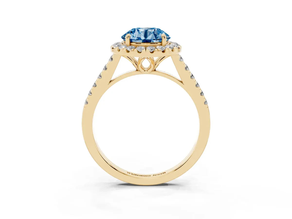Fancy Blue Round Cut Halo Pavé Diamond Engagement Ring with Four-Prong Setting Yellow gold