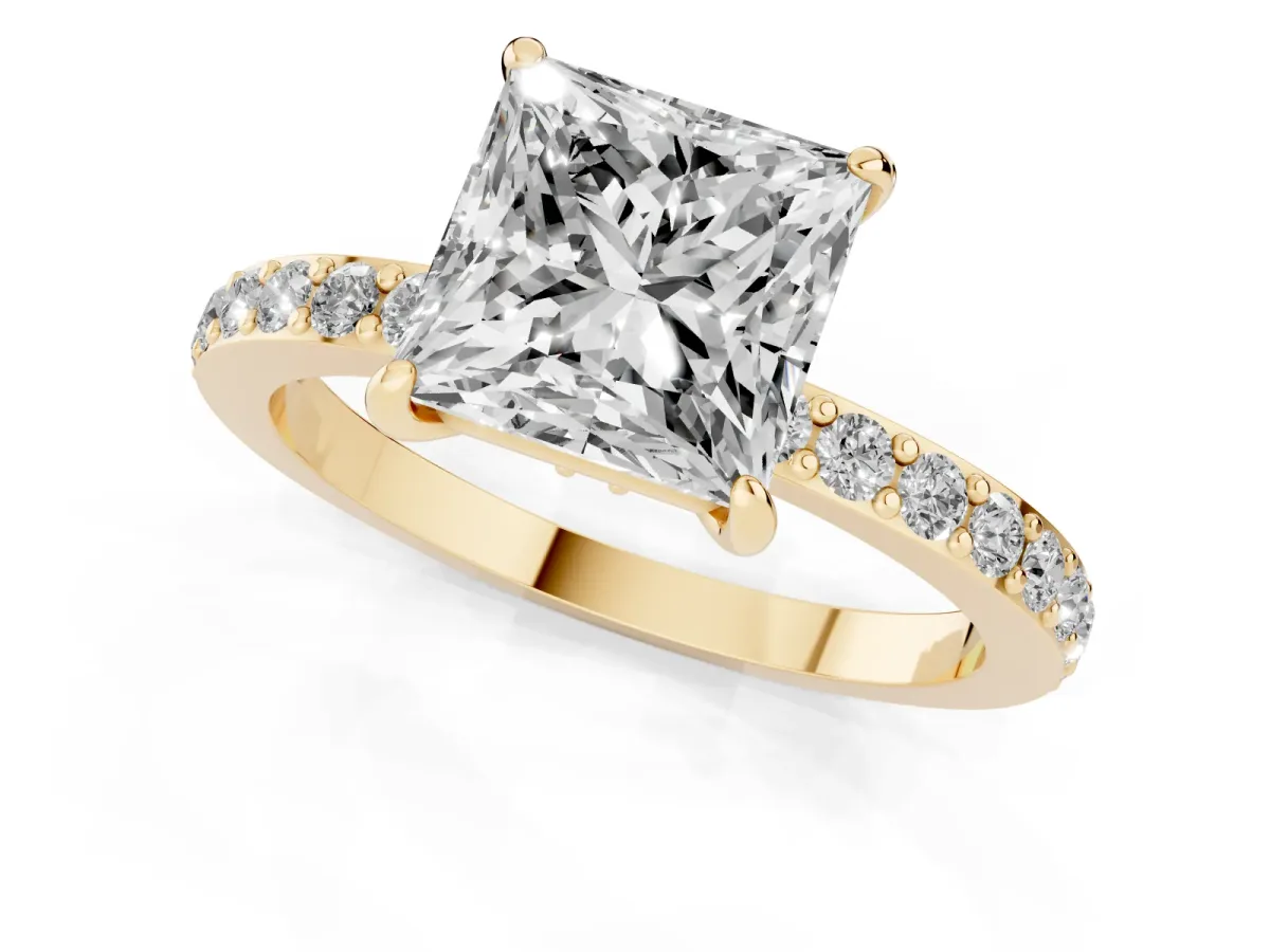 Princess Cut Diamond Solitaire Engagement Ring with Pavé Band and Four-Prong Setting Yellow gold