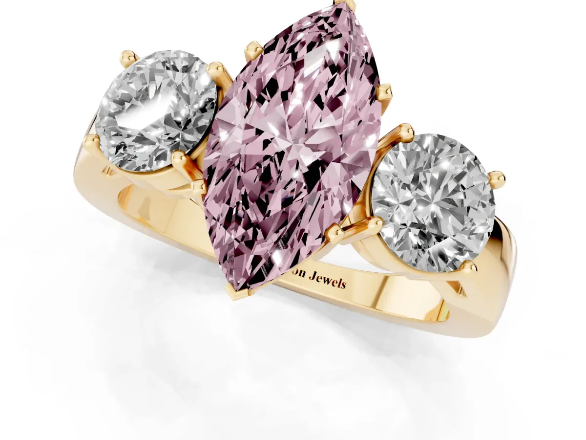 Fancy Pink Three-Stone Marquise Cut Diamond Ring with Round Side Stones, Classic Band, and Four-Prong Setting Yellow gold