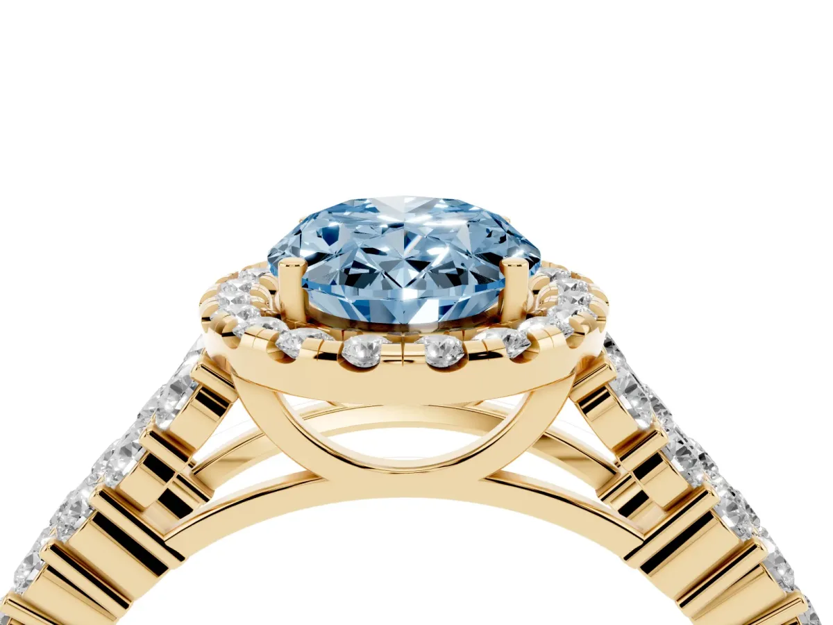 Fancy Blue Oval Cut Diamond Halo Engagement Ring with Triple Row Round Pavé Band and Prong Setting Yellow gold