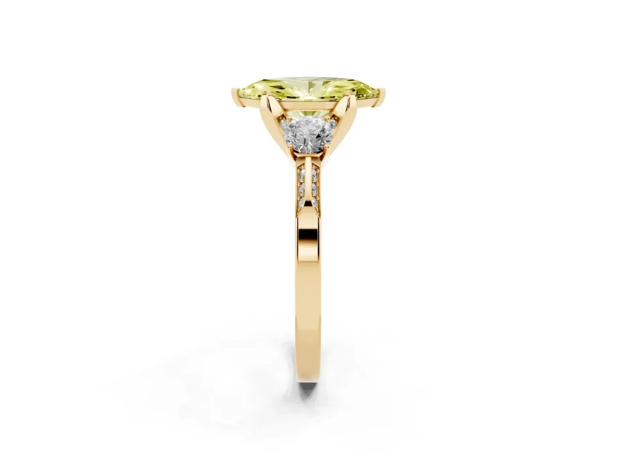 Fancy Yellow Marquise Cut Brilliant Three-Stone Diamond Ring with Pavé Band and Four-Prong Setting Yellow gold