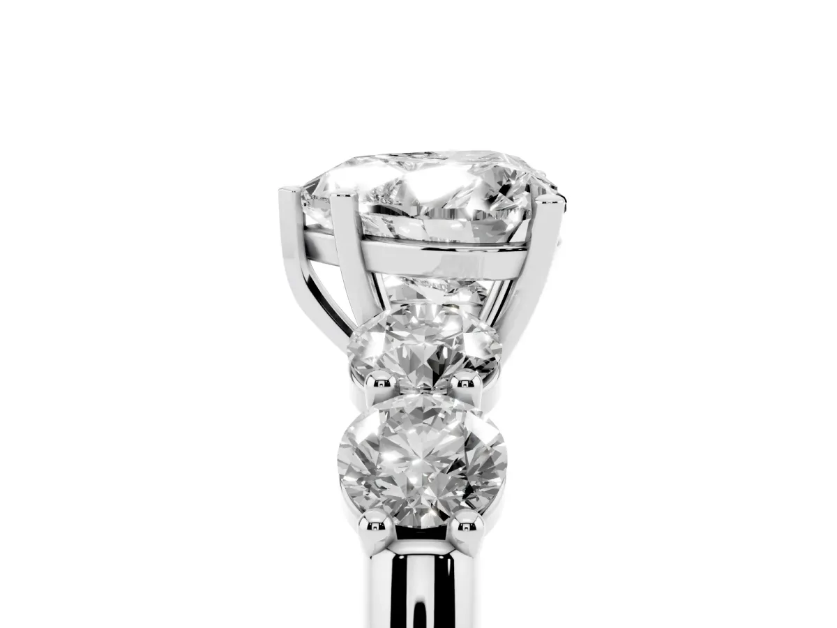 Heart Cut Cut Five-Stone Prong Set Diamond Ring with Classic Band Platinum