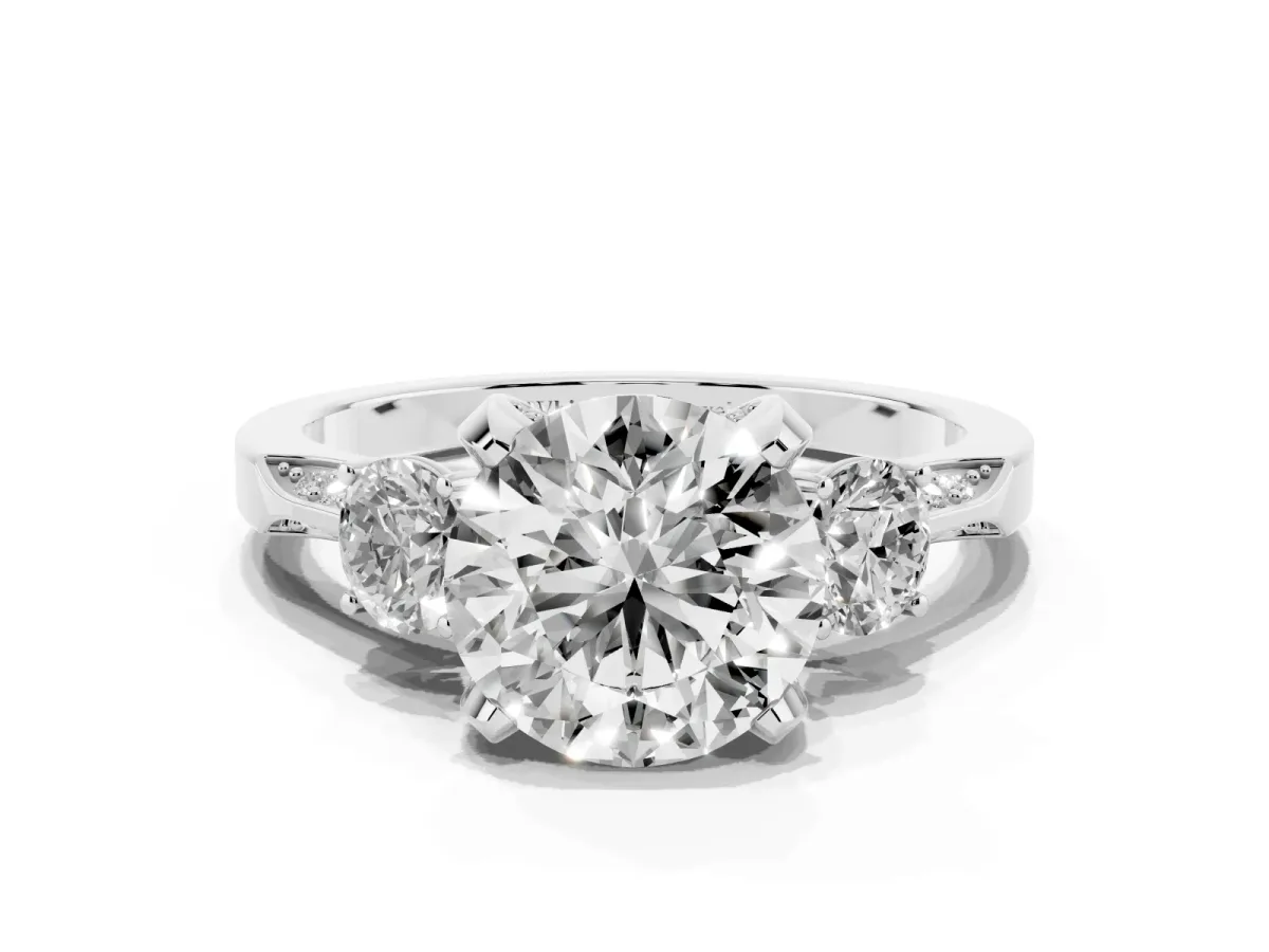 Round Cut Brilliant Three-Stone Diamond Ring with Pavé Band and Four-Prong Setting Silver