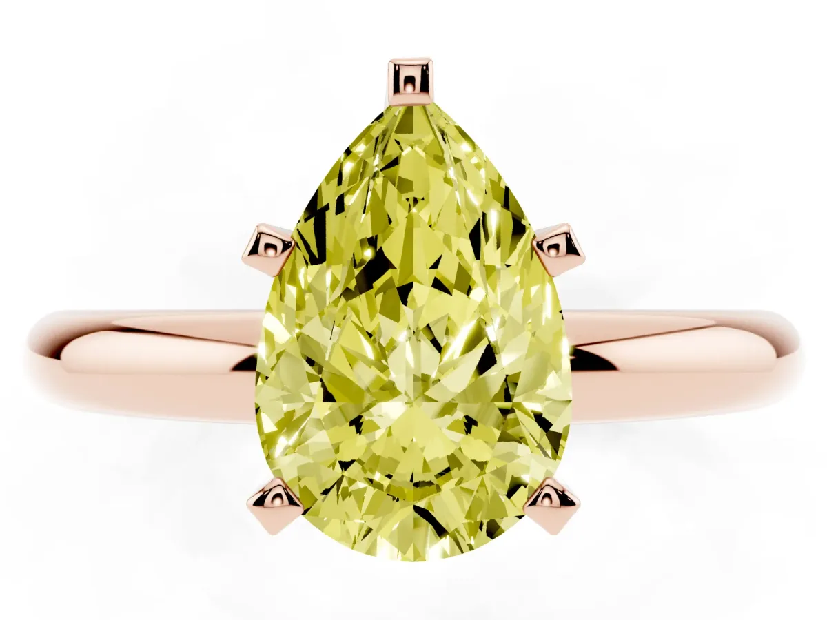 Fancy Yellow Pear Cut Diamond Solitaire Engagement Ring with Round Band and Four-Prong Setting Rose gold