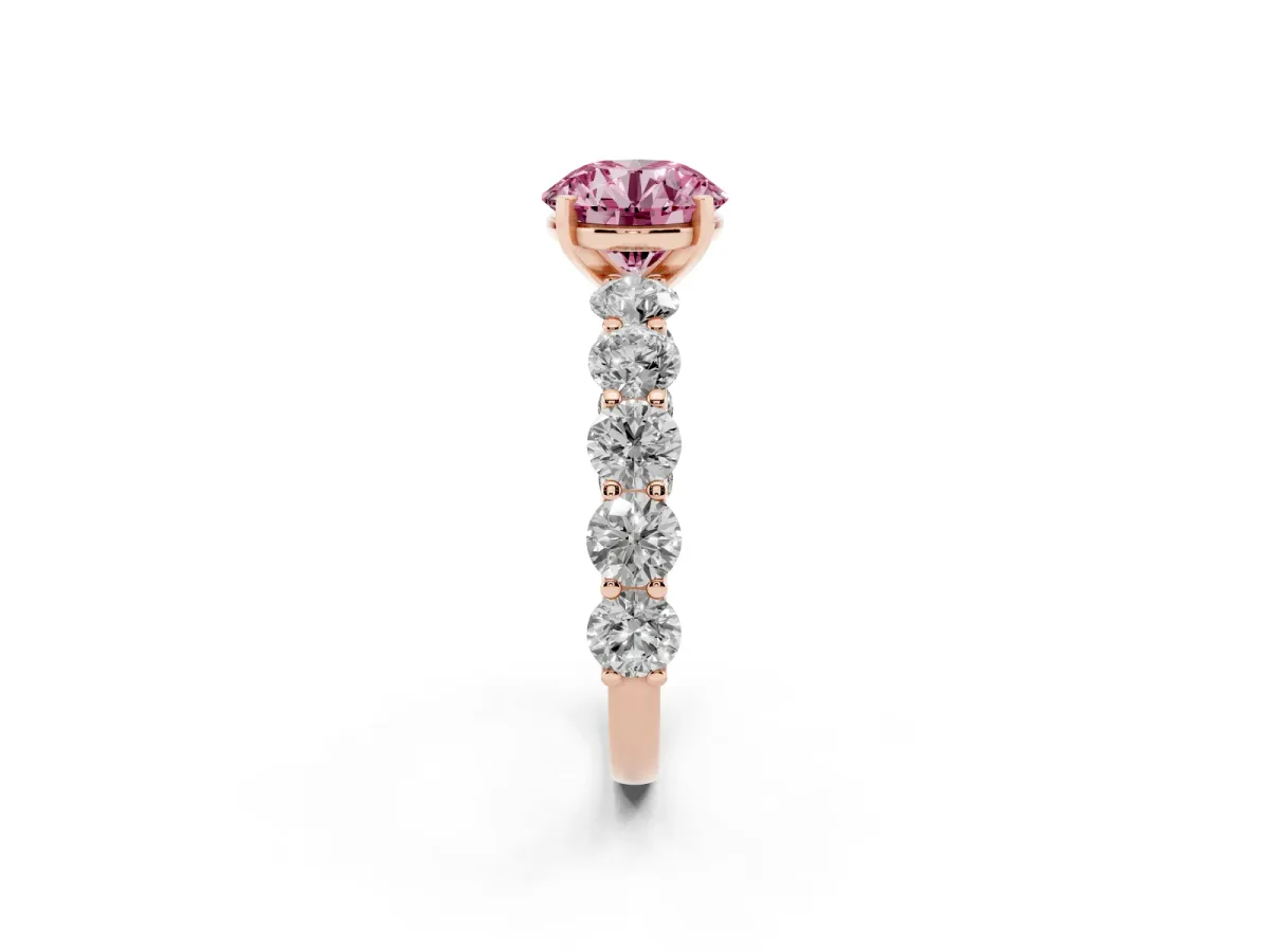 Fancy Pink Round Cut Diamond Prong Setting with Side Stones on a Pave Band Rose gold