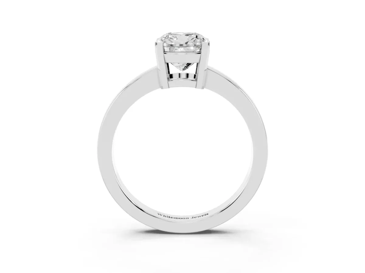 Cushion Cut Cut Solitaire Ring with Four-Prong Setting and Classic Band Silver