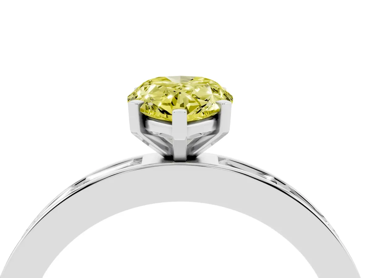 Fancy Yellow Pear Cut Solitaire Diamond Ring with Channel-Set Baguette Band and Four-Prong Setting Silver