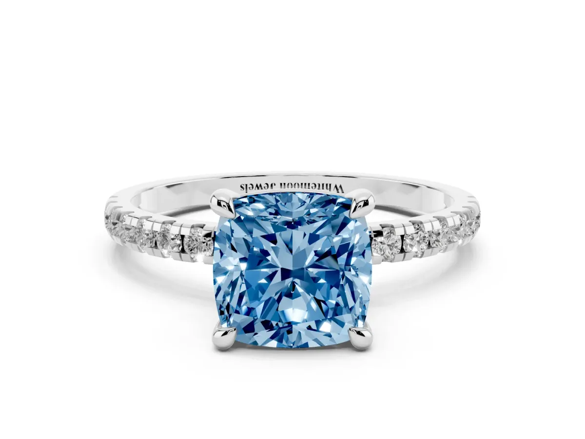 Fancy Blue Cushion Cut Diamond Brilliant Solitaire Ring with Pavé Band and Four-Prong Setting Silver