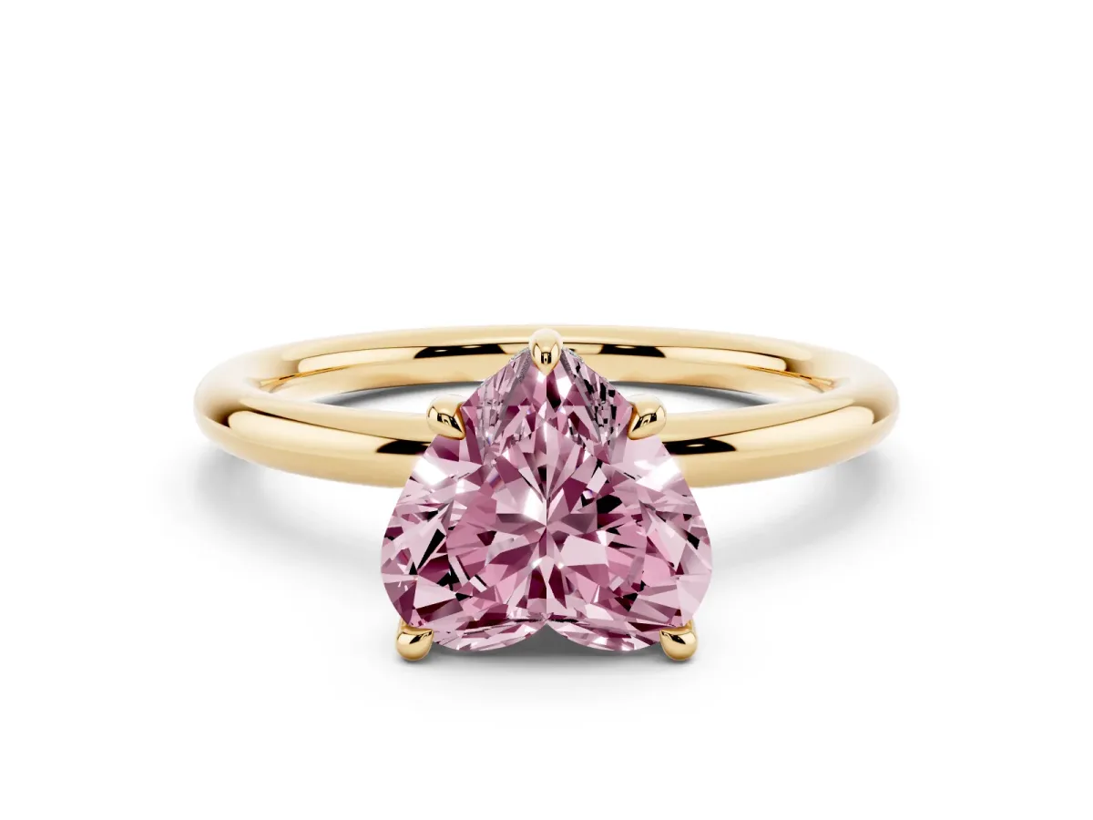 Fancy Pink Heart Cut Diamond Solitaire Ring with Thin Band and Four-Prong Setting Yellow gold