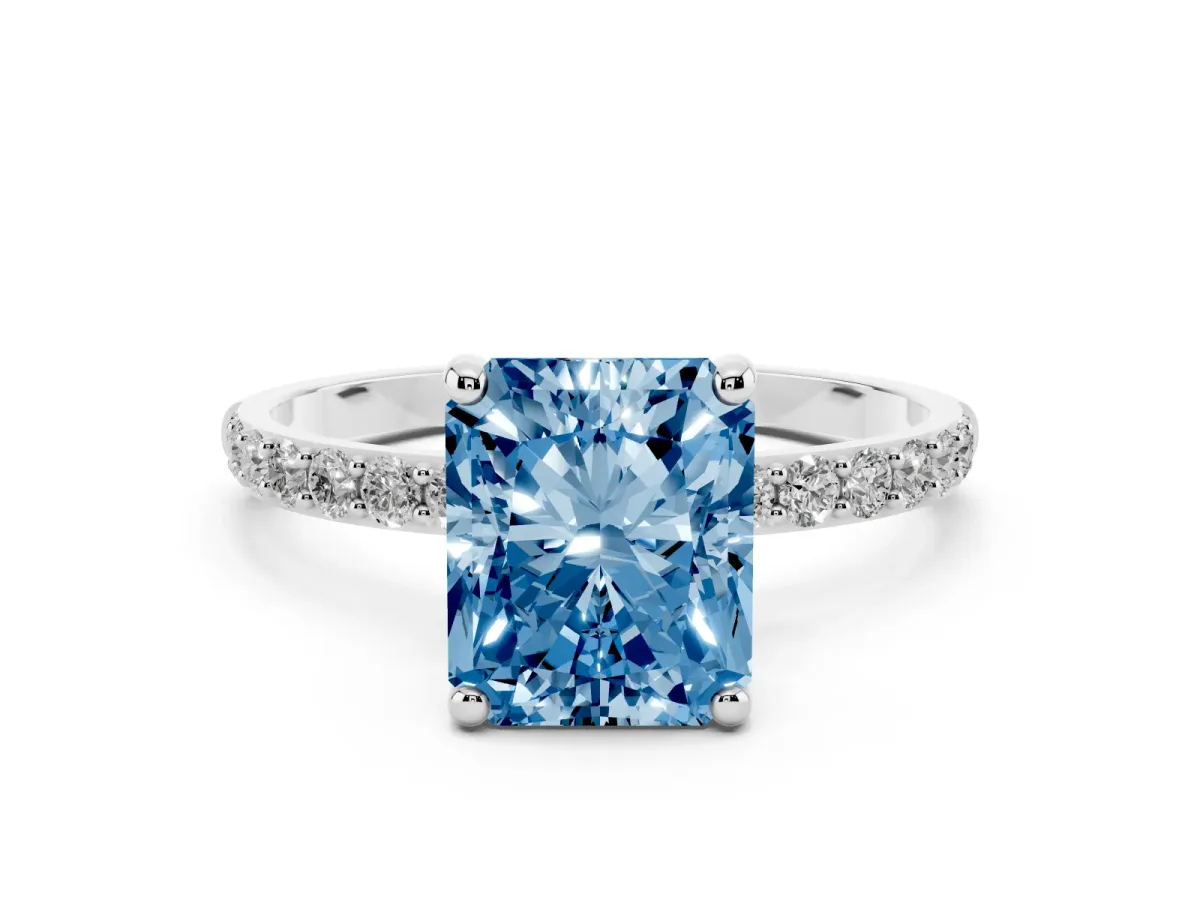 Fancy Blue Radiant Cut Diamond Solitaire Ring with Round Pavé Band and Prong Setting Silver
