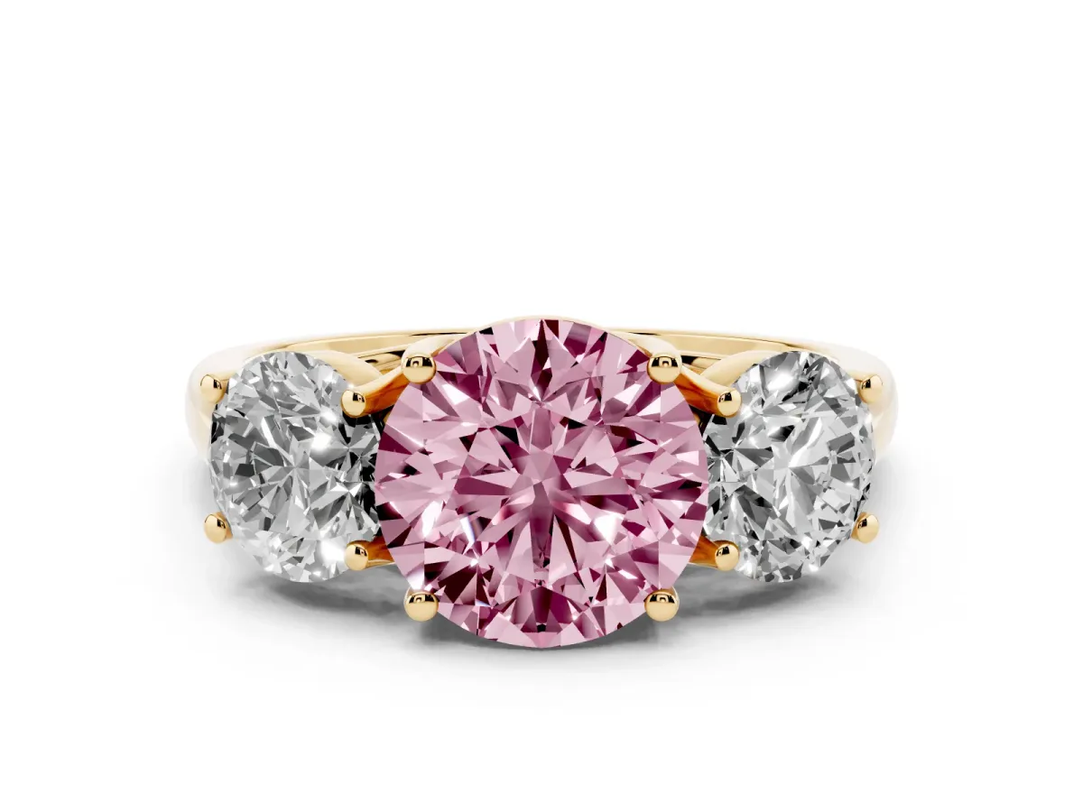 Fancy Pink Three-Stone Round Cut Diamond Engagement Ring with Prong Setting Yellow gold