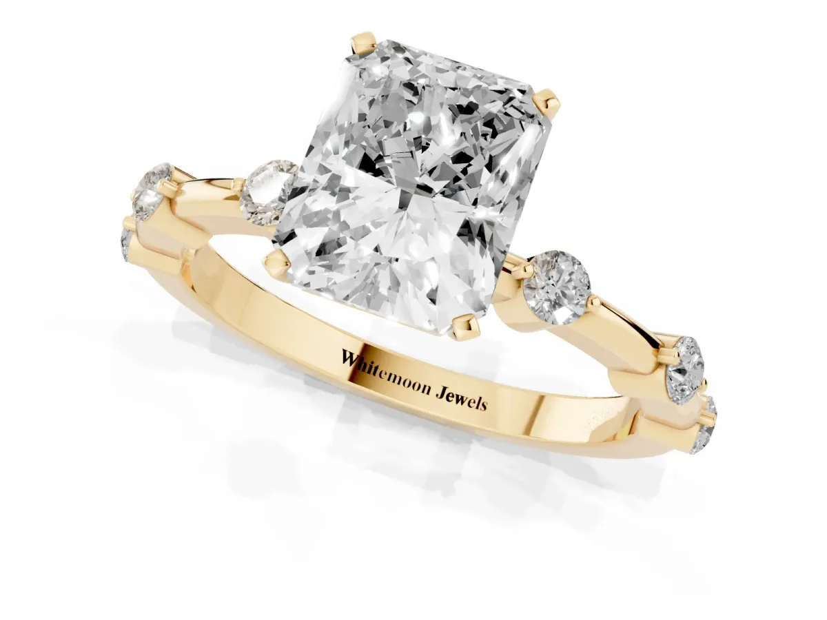 Radiant Cut Solitaire Diamond Ring with Bezel Set Side Stones and Prong Setting Yellow gold