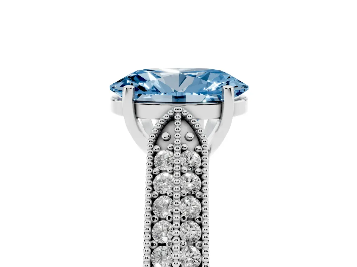 Fancy Blue Oval Cut Cut Pave Split Shank Engagement Ring with Four-Prong Setting White gold