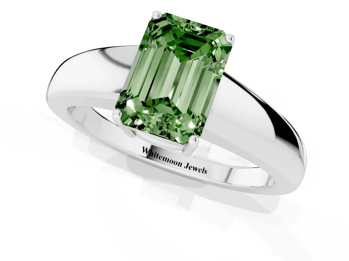 Fancy Green Emerald Cut Solitaire Diamond Ring with Tapered Band and Four-Prong Setting White gold