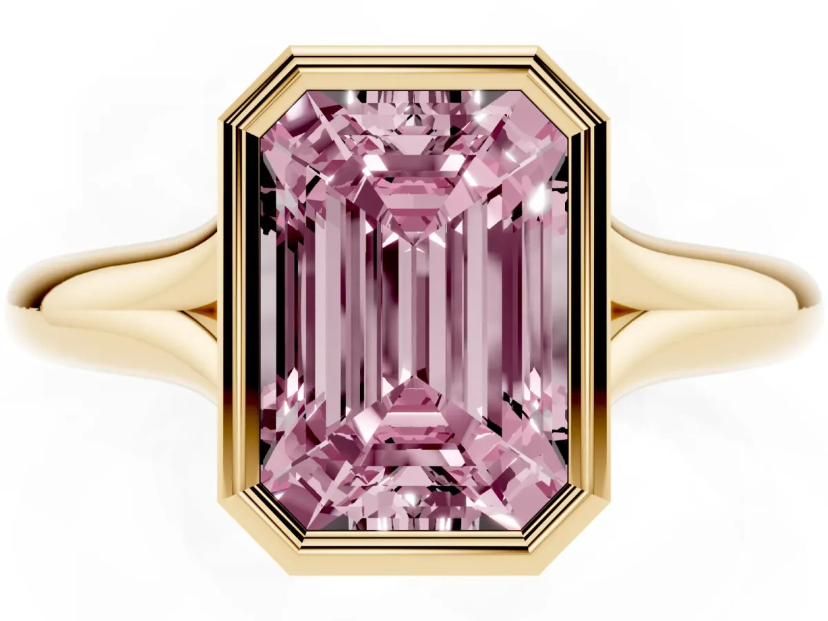 Fancy Pink Bezel Set Emerald Cut Solitaire Diamond Ring with Smooth Band Yellow gold