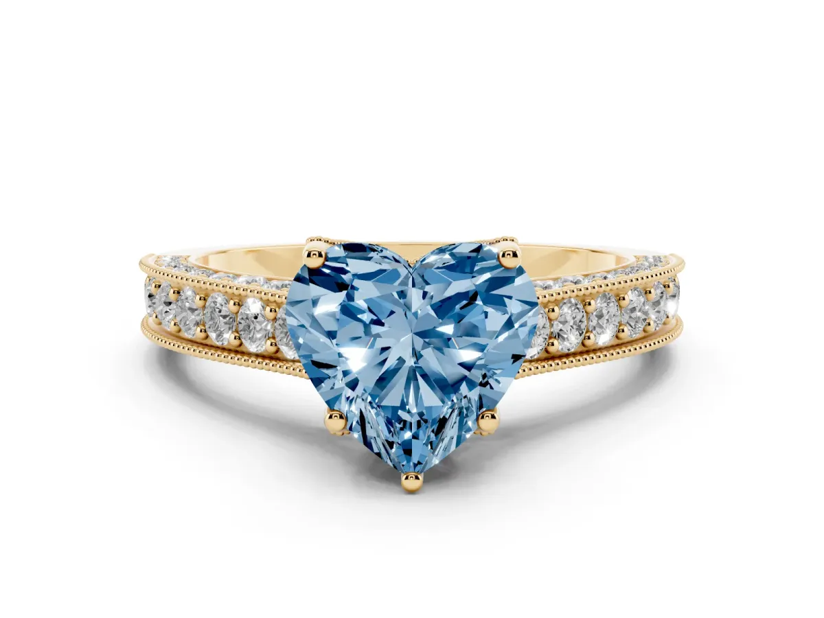 Fancy Blue Heart Cut Cut Diamond Solitaire Ring with Milgrain Pave Band and Four Prong Setting Yellow gold