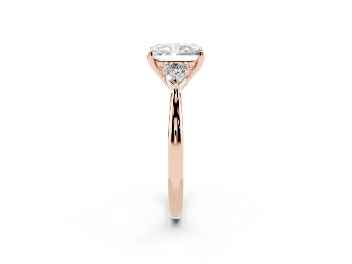 Radiant Cut Diamond Three-Stone Ring with Pear Side Stones and Prong Setting Rose gold
