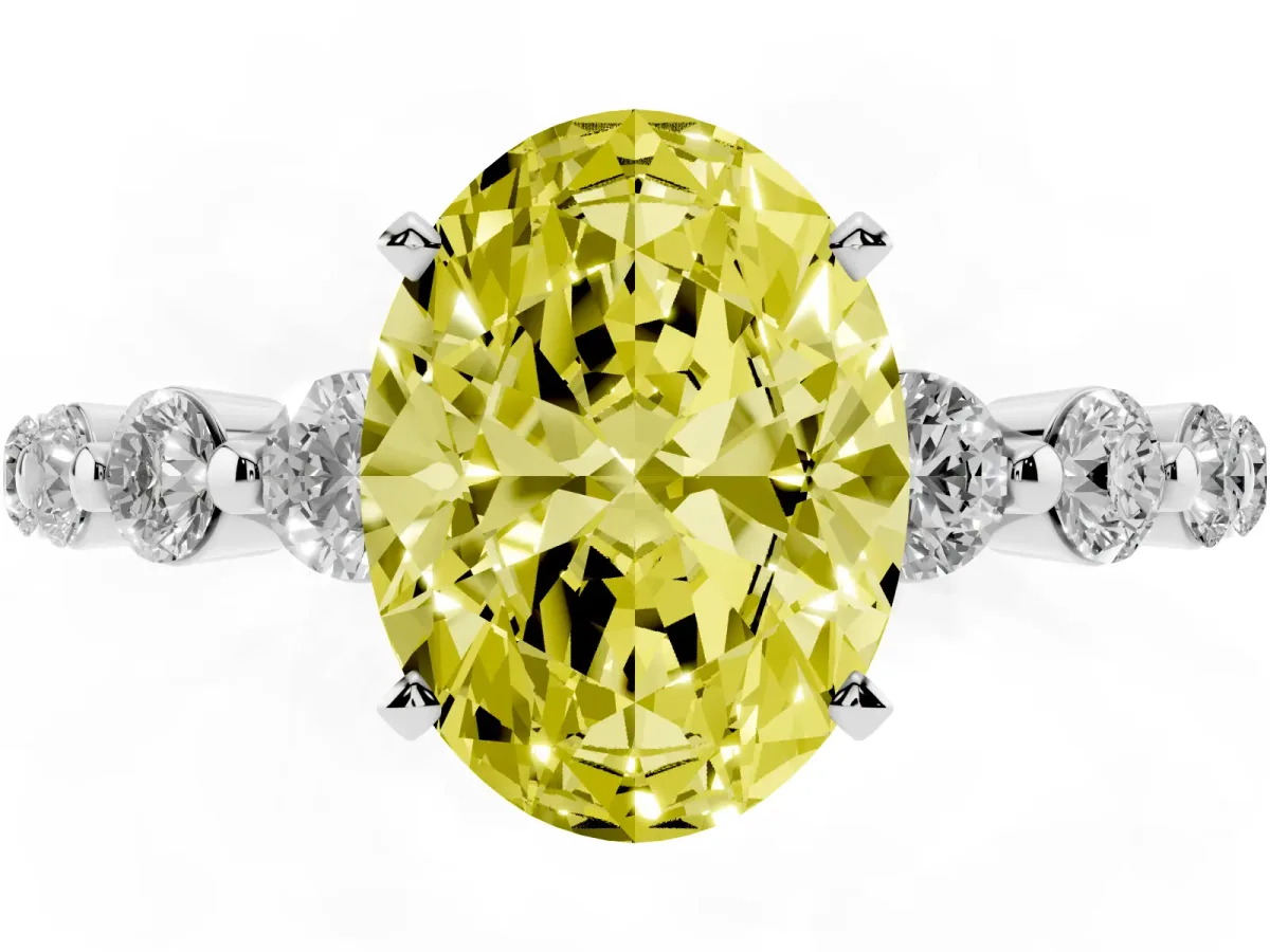 Fancy Yellow Oval Cut Solitaire Diamond Ring with Pave Band and Four-Prong Setting Silver