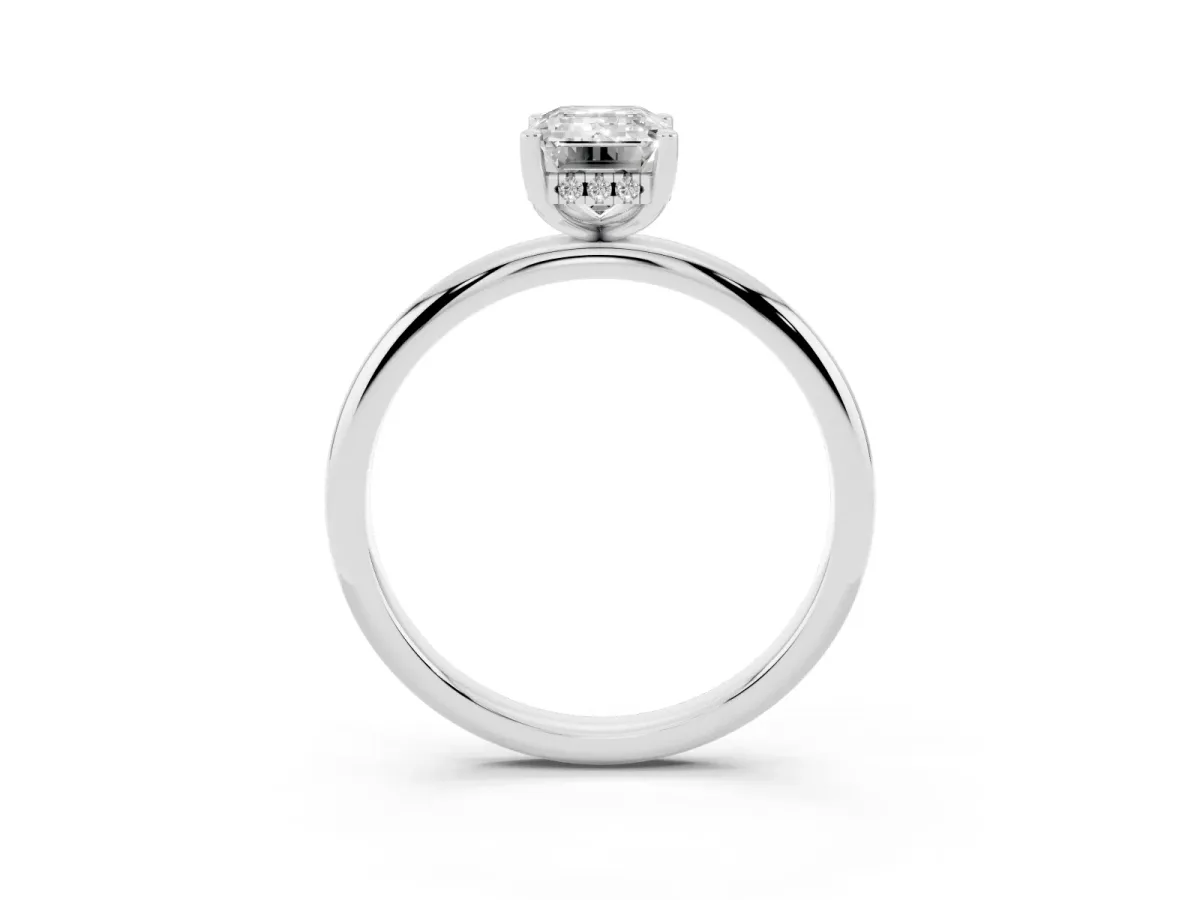 Emerald Cut Cut Solitaire Engagement Ring with Four-Prong Setting and Classic Band Silver