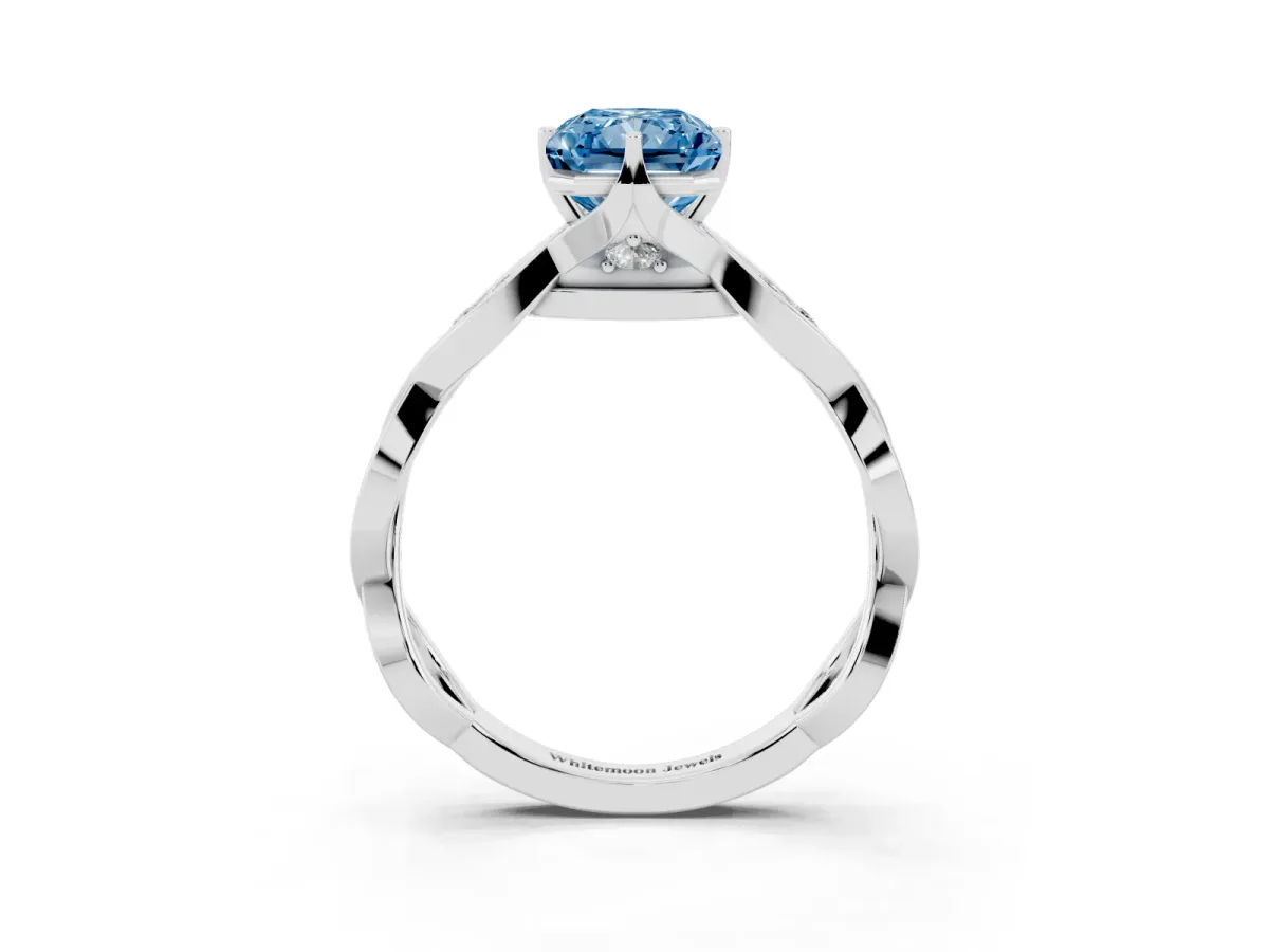 Fancy Blue Radiant Cut Solitaire Twist Band with Leaf Prong Setting Silver