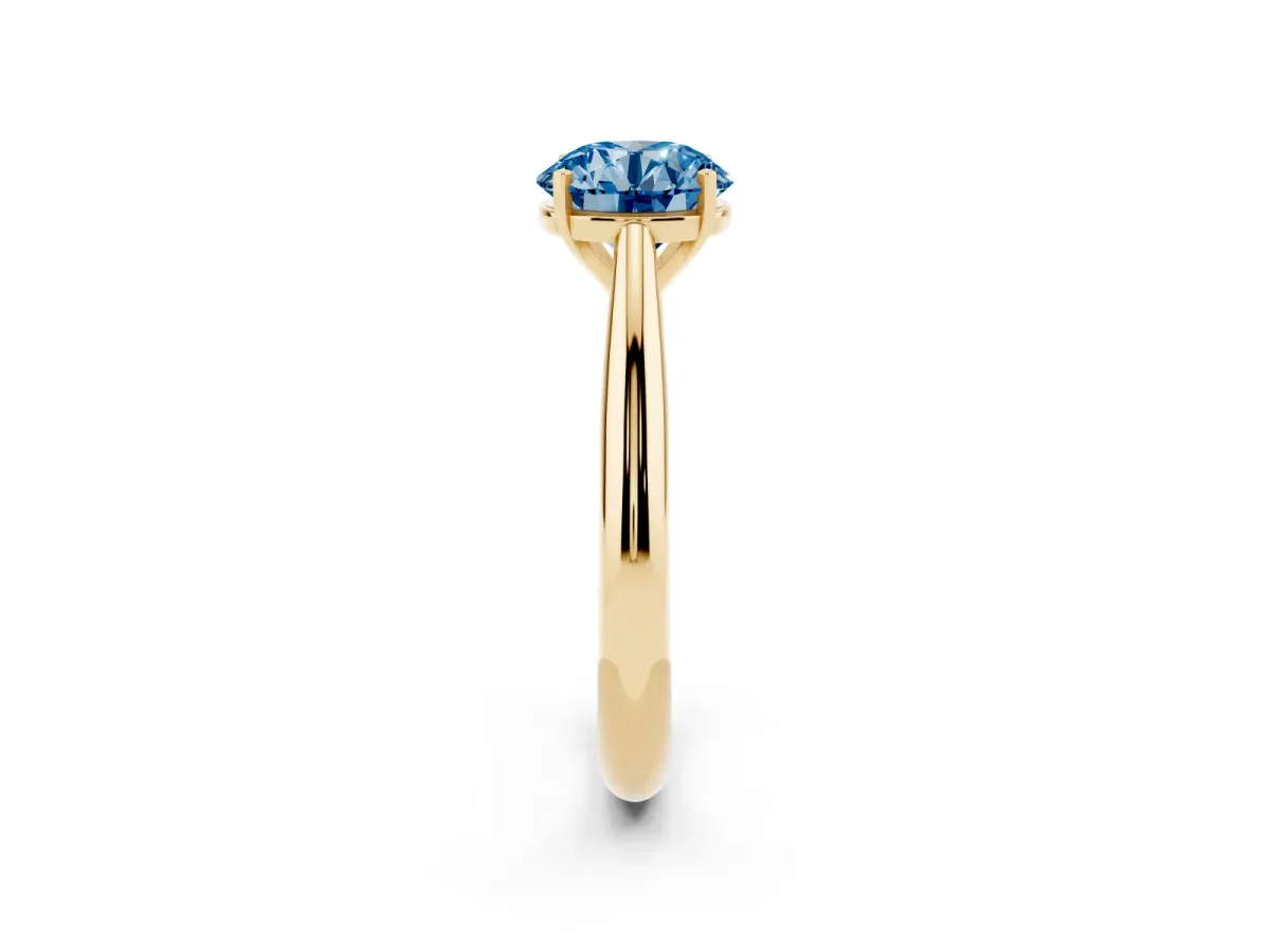 Fancy Blue Round Cut Diamond Solitaire Engagement Ring with Cathedral Setting and Four-Prong Mount Yellow gold