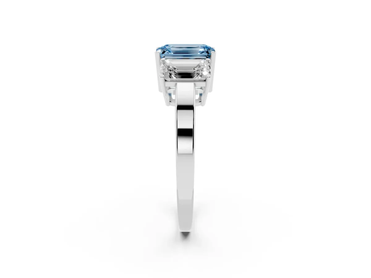 Fancy Blue Three-Stone Emerald Cut Cut Diamond Engagement Ring with Flat Band and Four-Prong Setting Platinum