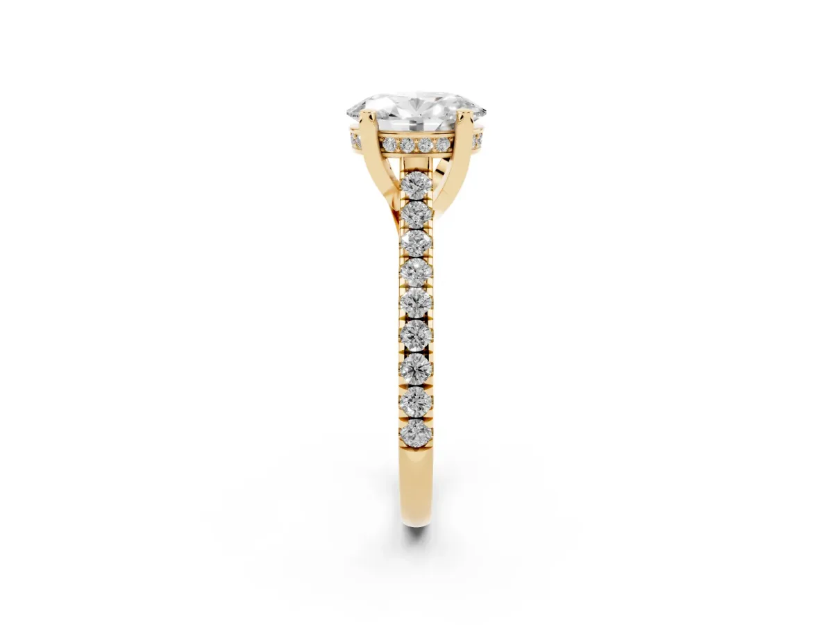 Oval Cut Brilliant Diamond Solitaire with Pavé Band and Four-Prong Setting Yellow gold
