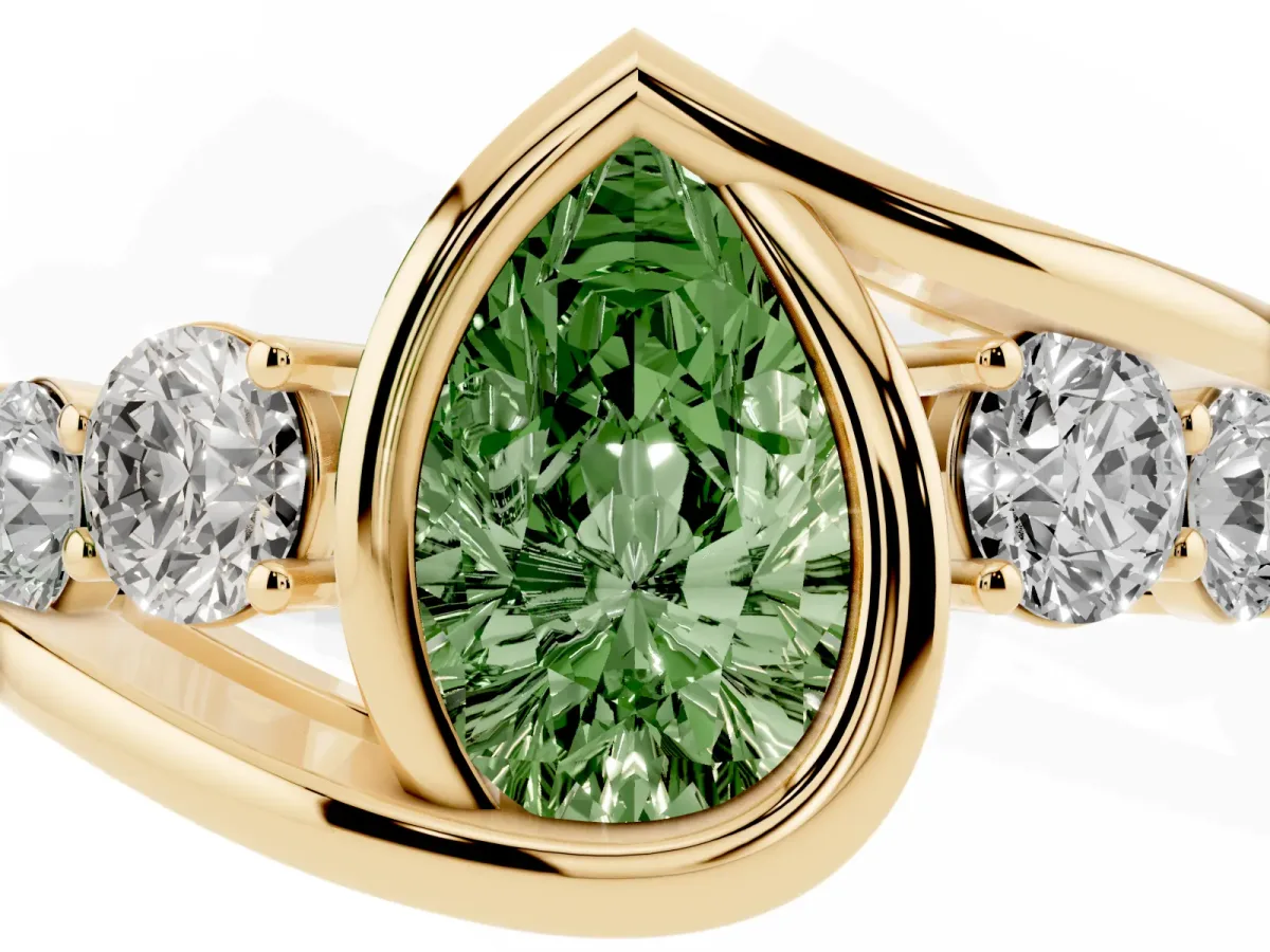 Fancy Green Bezel Set Pear Cut Diamond Bypass Ring with Round Accents Yellow gold