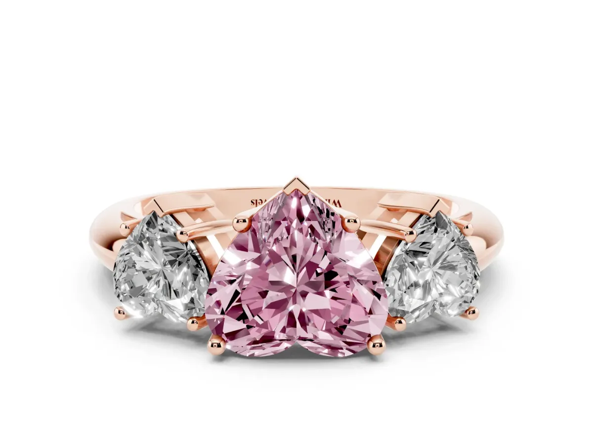 Fancy Pink Three-Stone Heart Cut Cut Diamond Engagement Ring with Prong Setting on a White Gold Band Rose gold