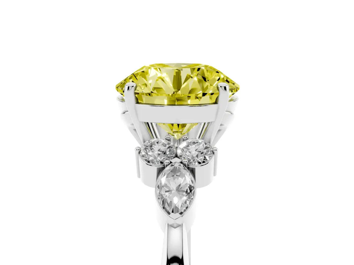 Fancy Yellow Round Cut Brilliant Diamond Solitaire Ring with Pear Side Stones and Four-Prong Setting White gold