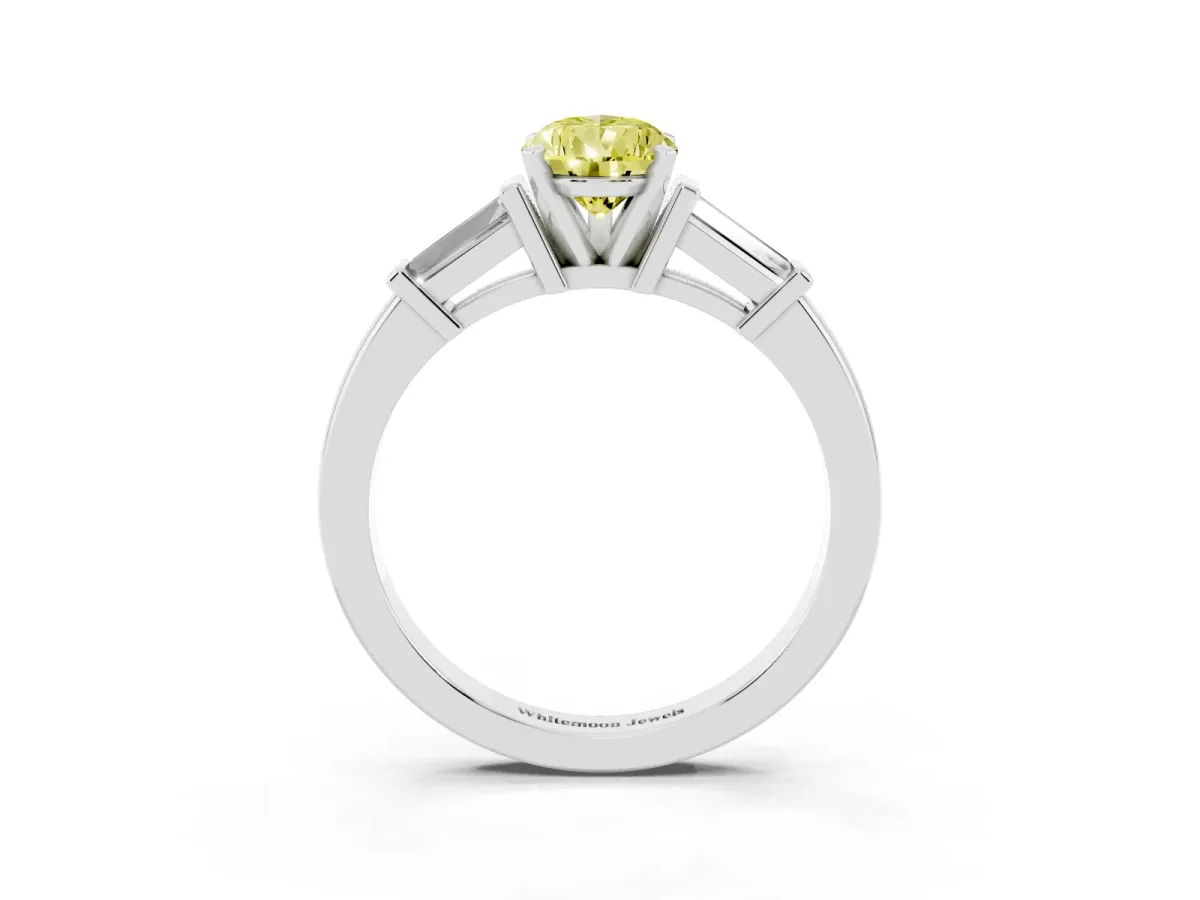 Fancy Yellow Pear Cut Cut Diamond Solitaire Ring with Tapered Baguette Accents and Four-Prong Setting Silver