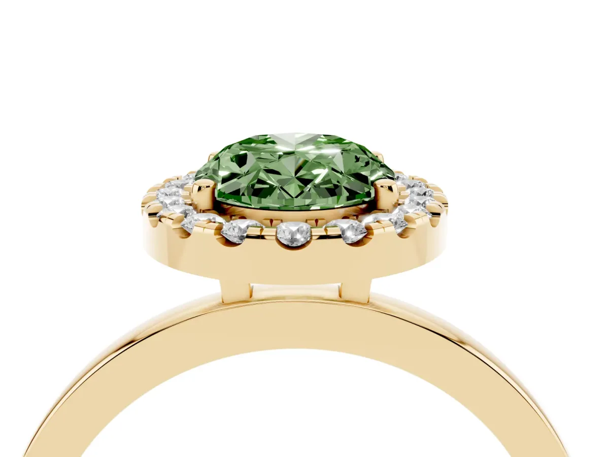 Fancy Green Oval Cut Halo Diamond Solitaire with Pavé Band and Four-Prong Setting Yellow gold