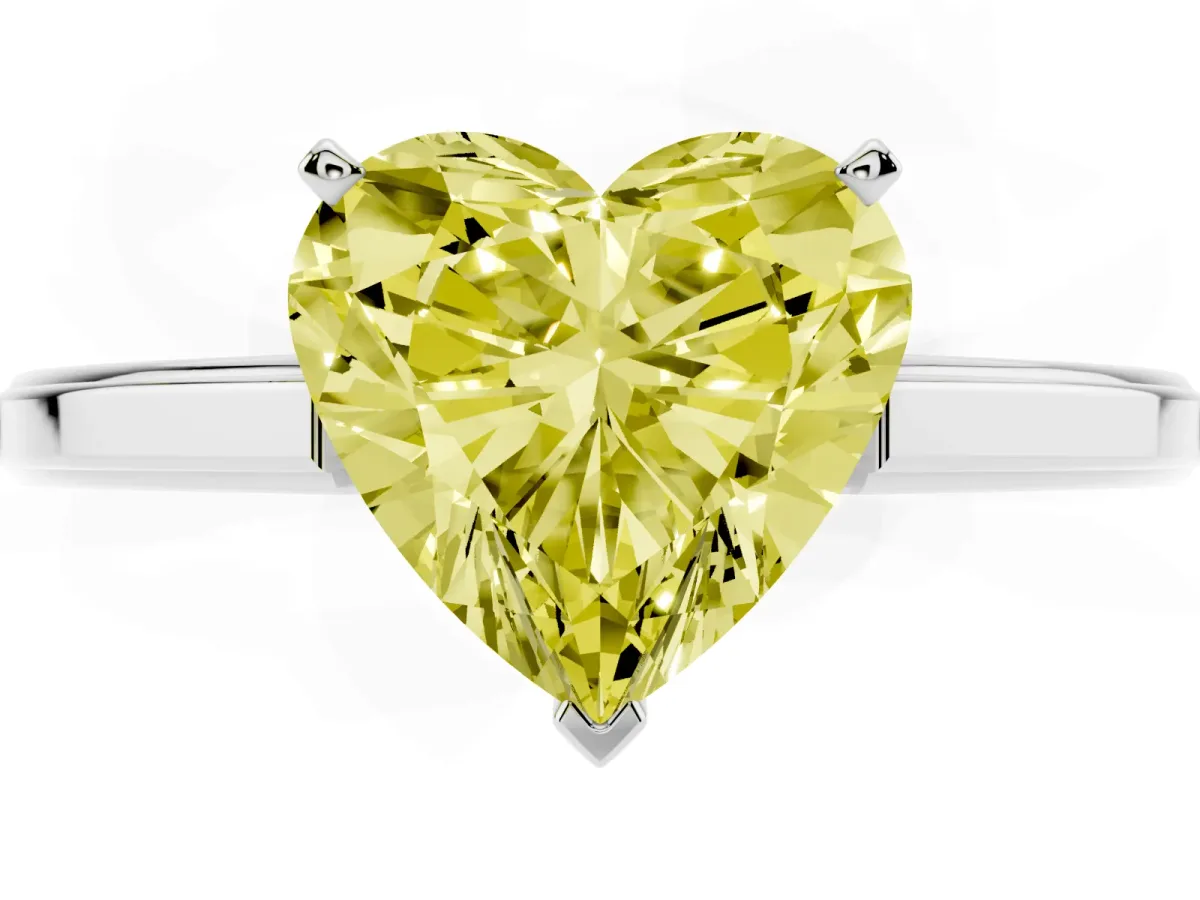 Fancy Yellow Heart Cut Solitaire Diamond Ring with Four-Prong Setting and Classic Band Silver