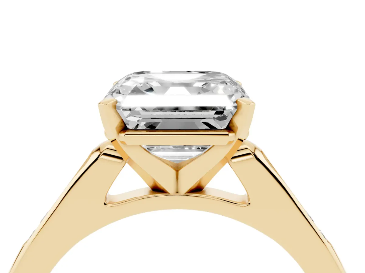 Asscher Cut Diamond Solitaire Ring with Channel Set Round Band and Prong Setting Yellow gold