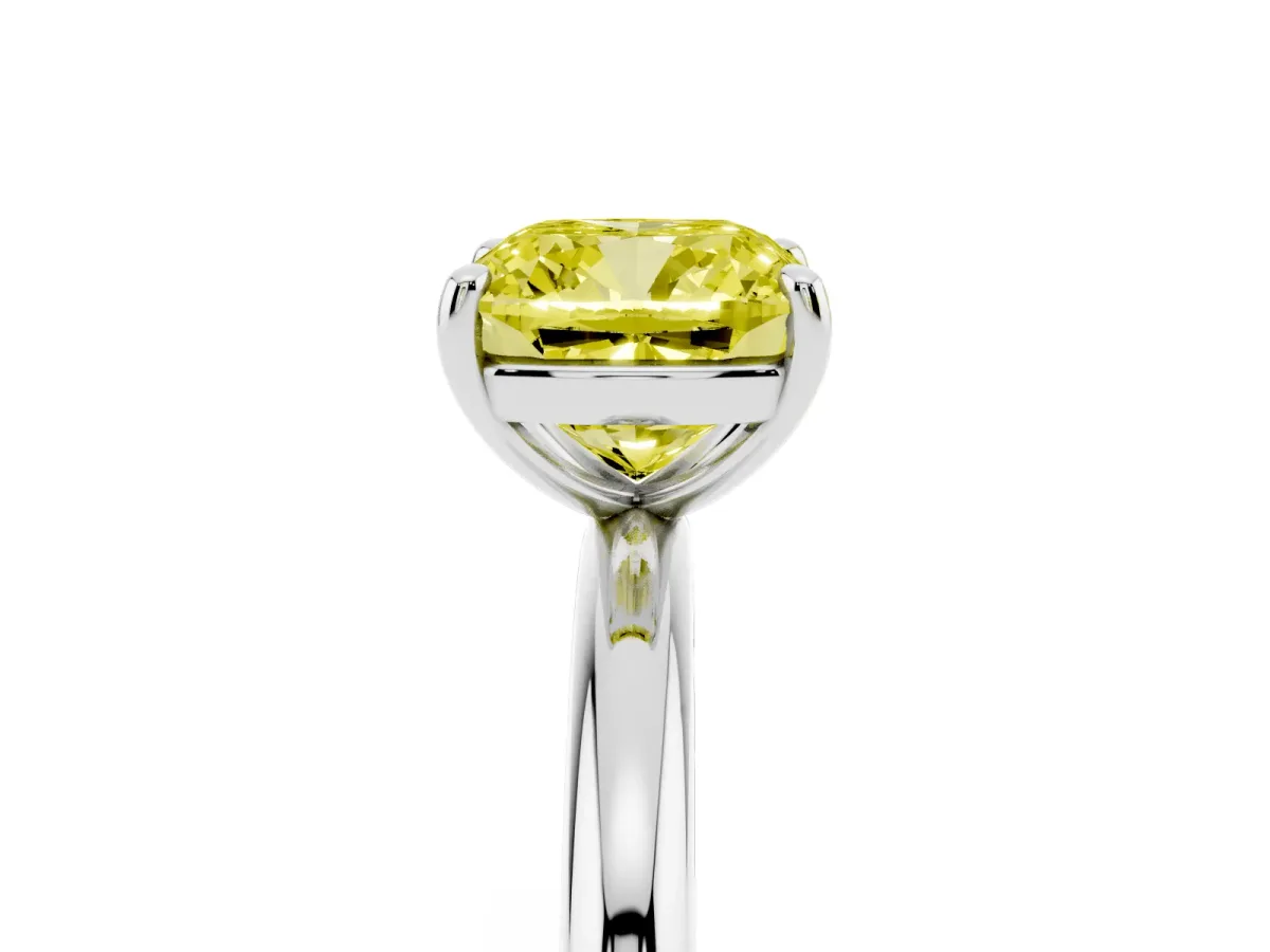 Fancy Yellow Cushion Cut Solitaire Diamond Ring with Four-Prong Setting on a Plain Band Silver