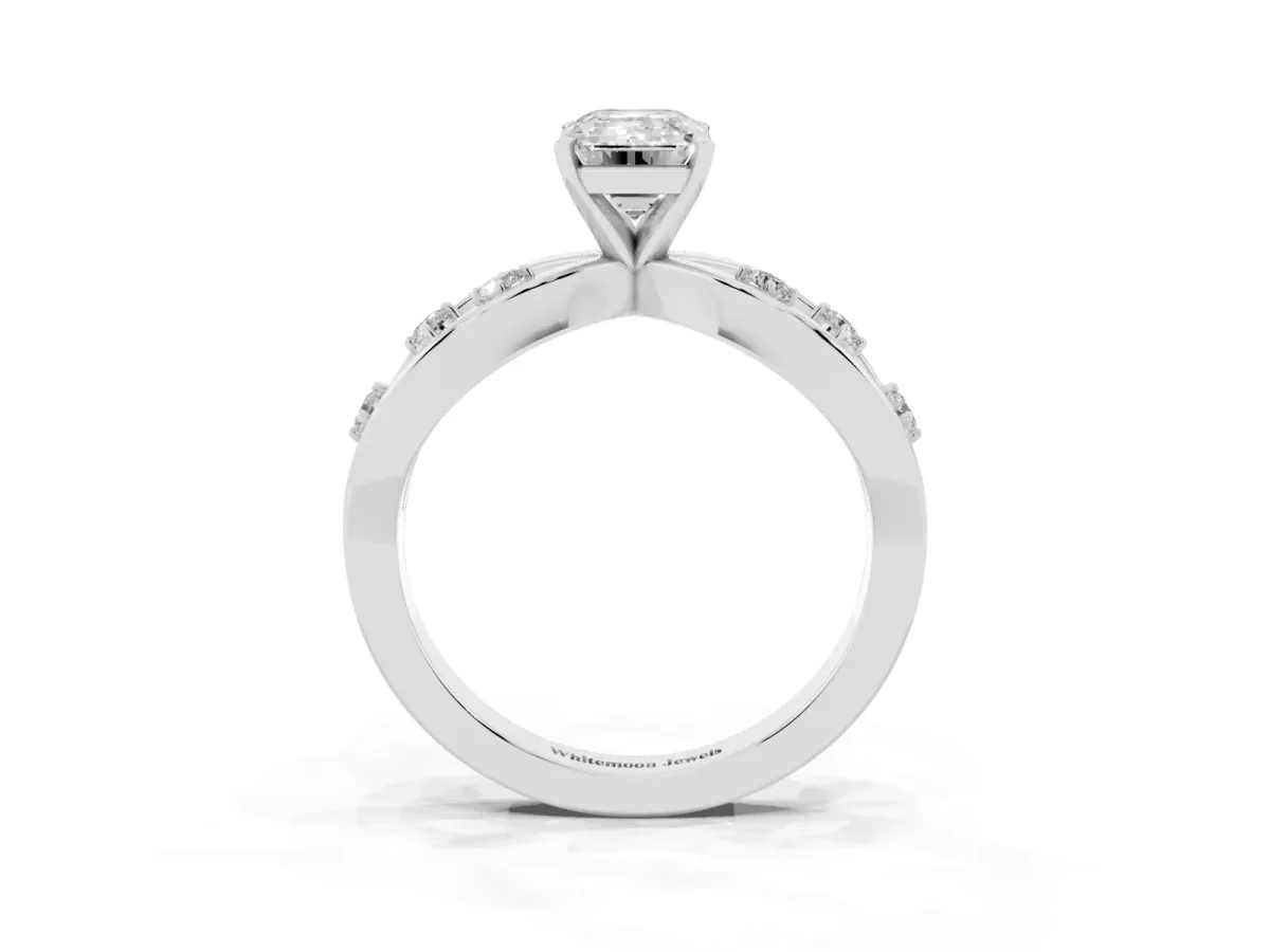 Emerald Cut Cut Solitaire Diamond with Side Stones on Criss-Cross Band and Four-Prong Setting Platinum