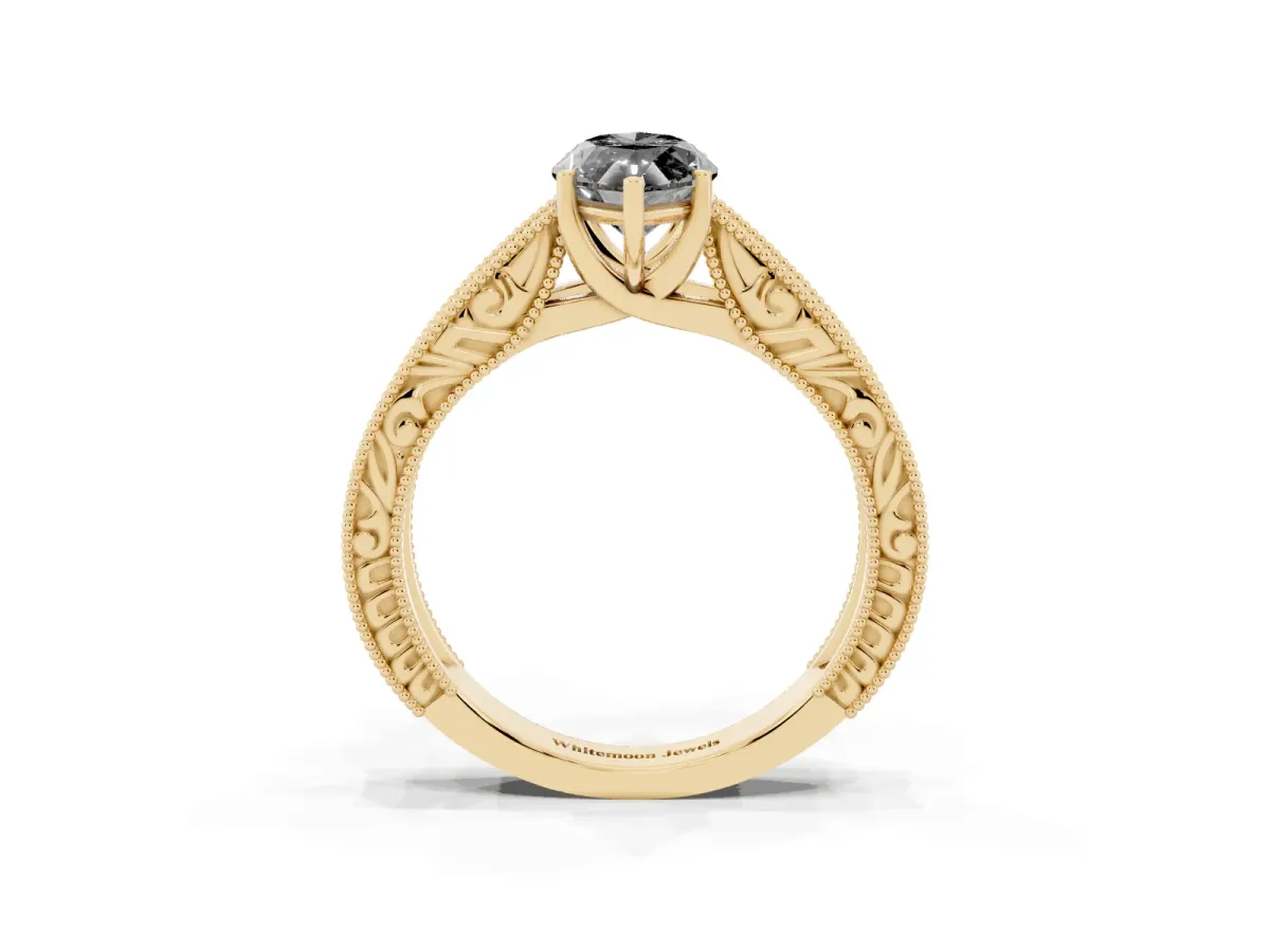 Fancy Black Marquise Cut Diamond Solitaire Ring with Engraved Band and Four-Prong Setting Yellow gold