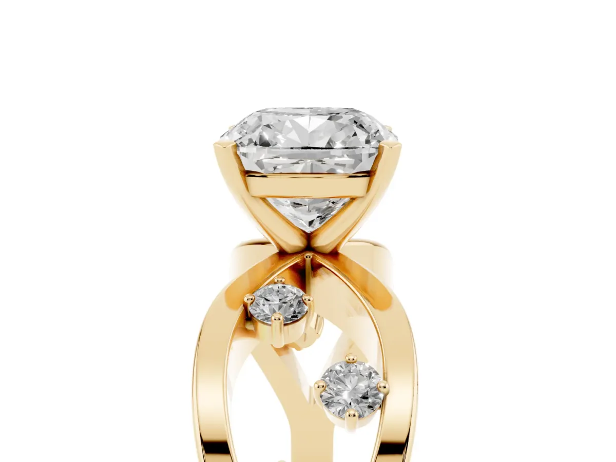 Cushion Cut Cut Solitaire Diamond with Side Stones on Criss-Cross Band and Four-Prong Setting Yellow gold