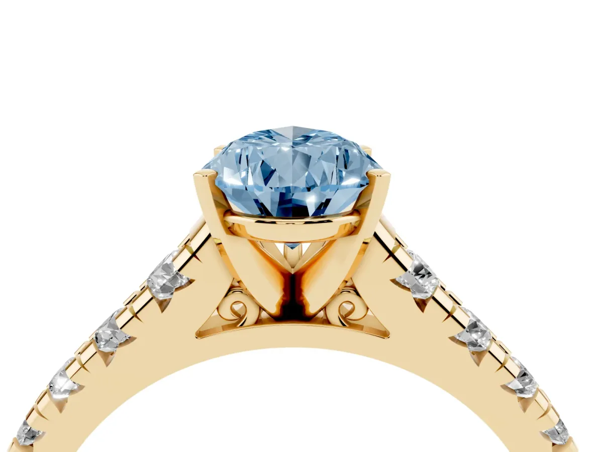 Fancy Blue Pear Cut Diamond Cathedral Solitaire Ring with Round Pavé Band Yellow gold
