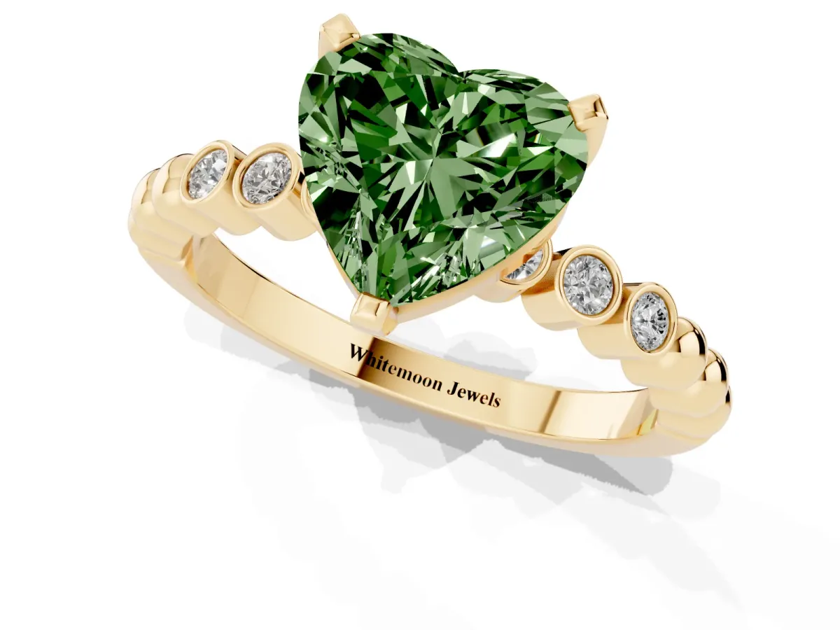 Fancy Green Heart Cut Solitaire Bezel Accent Diamond Engagement Ring with Beaded Band and Four-Prong Setting Yellow gold
