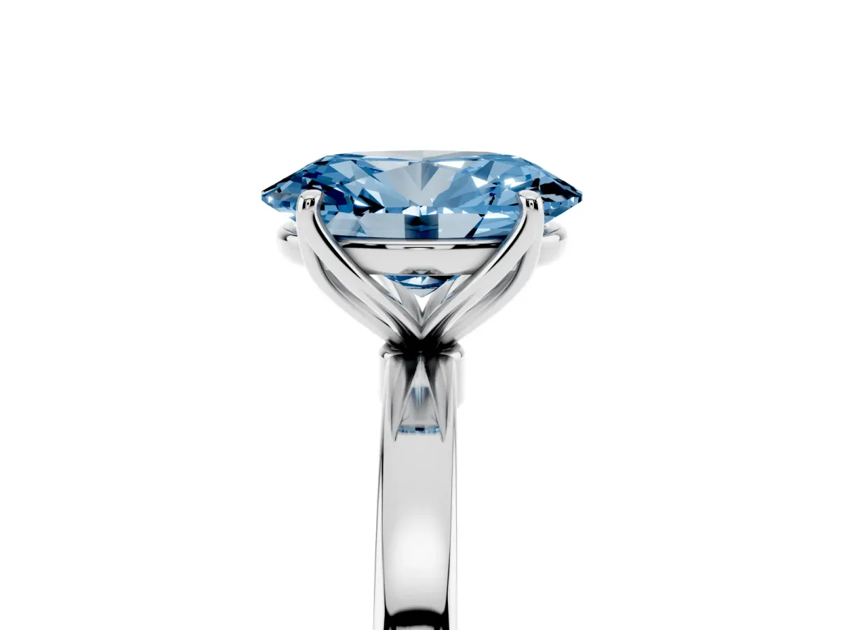 Fancy Blue Oval Cut Diamond Solitaire Ring with Thin Band and Prong Setting Silver