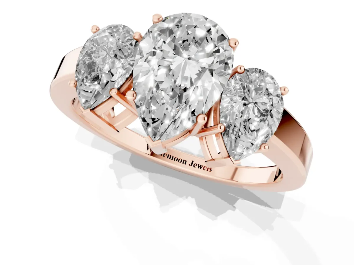 Three-Stone Pear Cut Cut Diamond Engagement Ring with Flat Band and Four-Prong Setting Rose gold