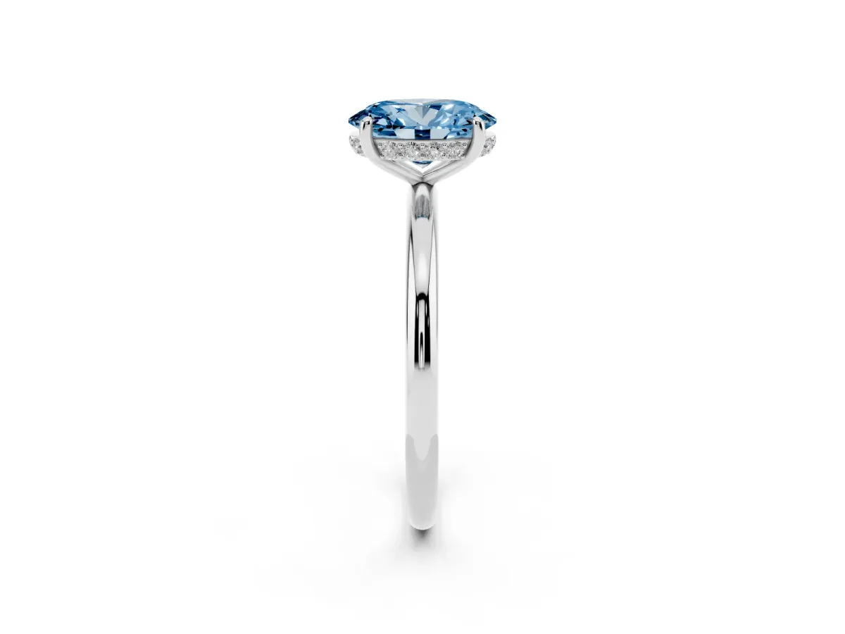 Fancy Blue Oval Cut Solitaire Diamond Ring with a Classic Band and Four-Prong Setting Platinum