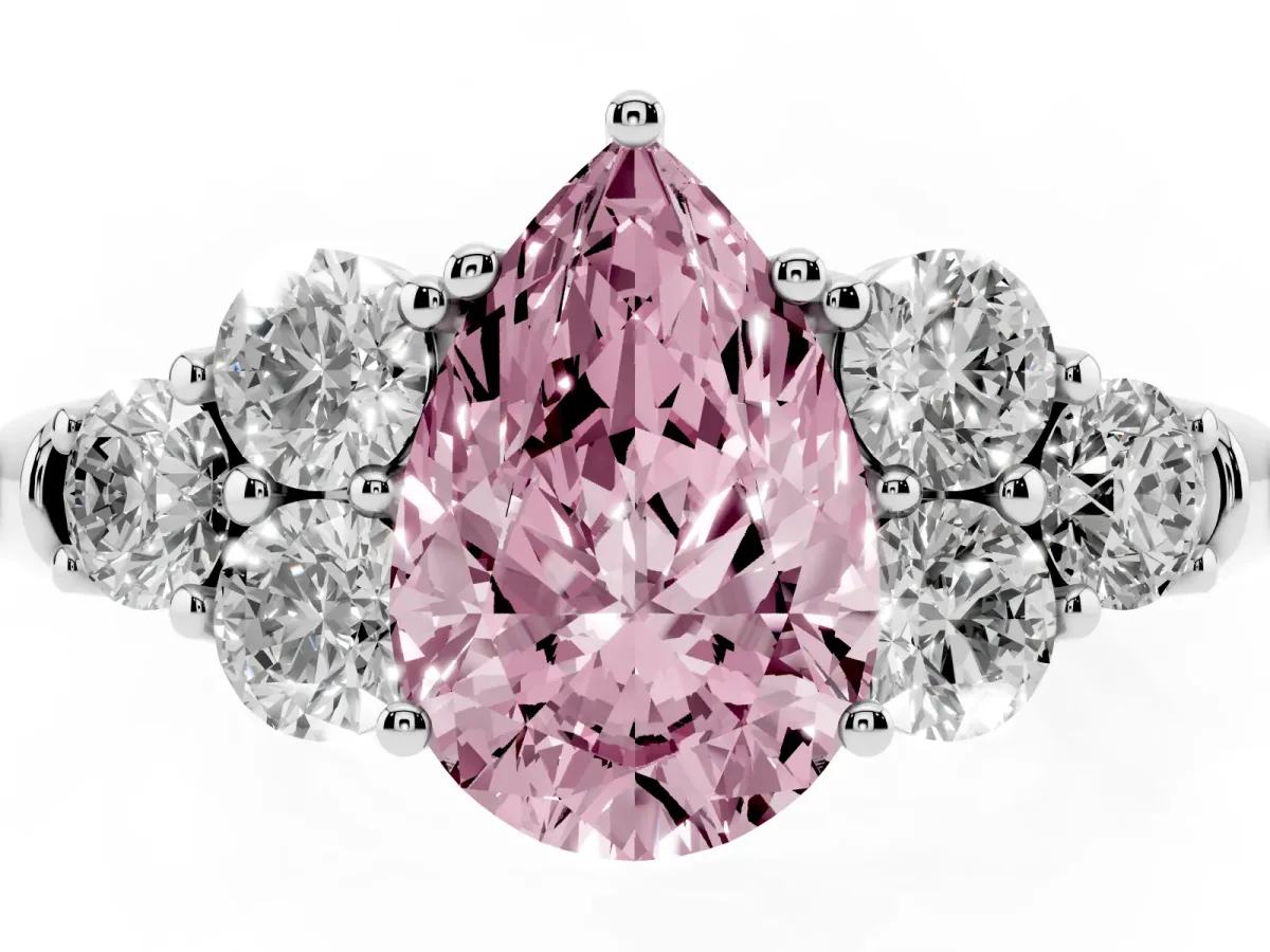 Fancy Pink Pear Cut Cut Diamond Cluster Ring with Round Accent Stones and Prong Setting on a Classic Band White gold