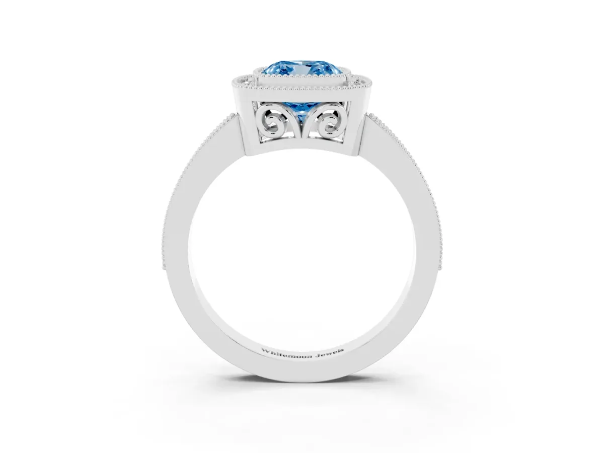 Fancy Blue Cushion Cut Cut Halo Diamond Ring with Pavé Band and Milgrain Prong Setting Platinum